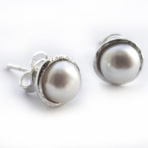 Pärlörhängen vita